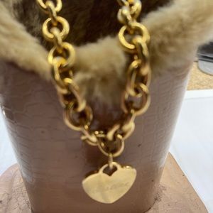 necklace with “Justine”